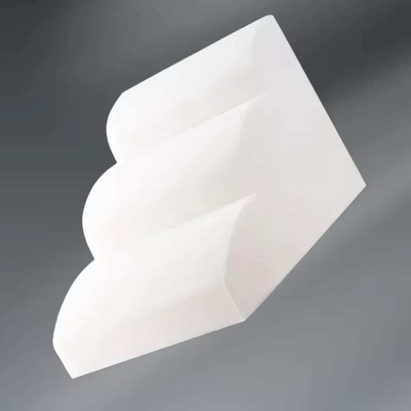 White foam paw-shaped wall decor or protector on gray background