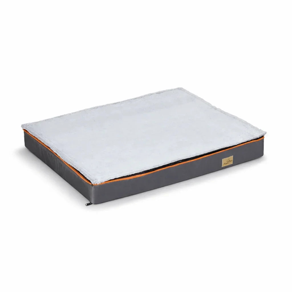 orthopedic gray pet bed with soft white top and orange trim on white background